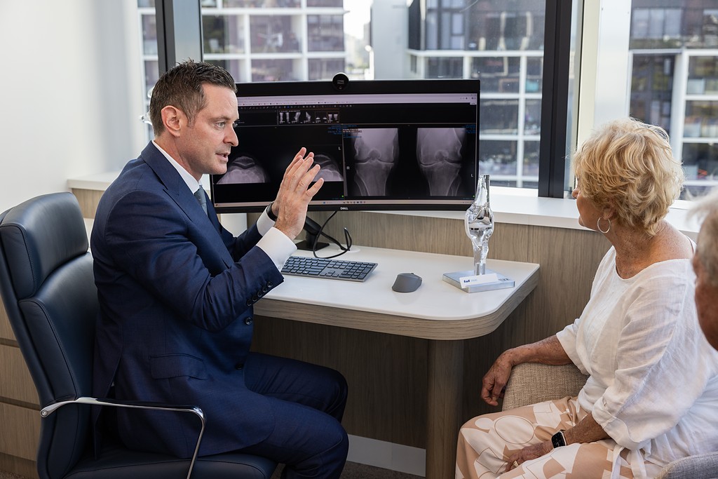 Professor Rodda talking a patient through the options